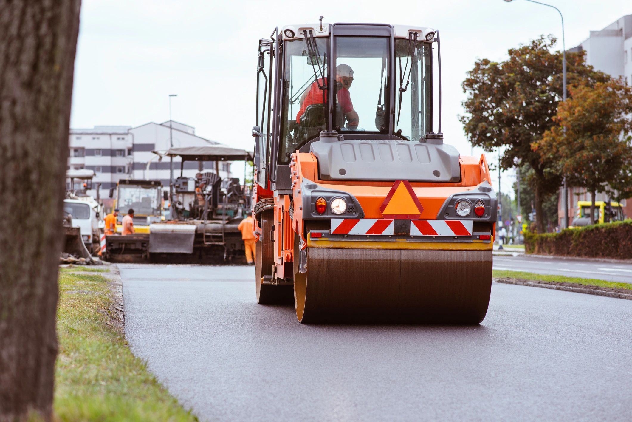 Road roller compactor on construction street